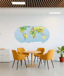 Modern office break room with round wooden table and orange chairs, white cabinet, and a potted plant against a pale wall with a world map graphic partially visible on the wall.