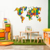 | Casadart | Vinis Autocolantes, Papel de Parede e Painéis Decorativos Wall map mural made from colorful block pieces (LEGO-style) on a white wall in a children’s playroom, with wooden shelves and toys nearby.