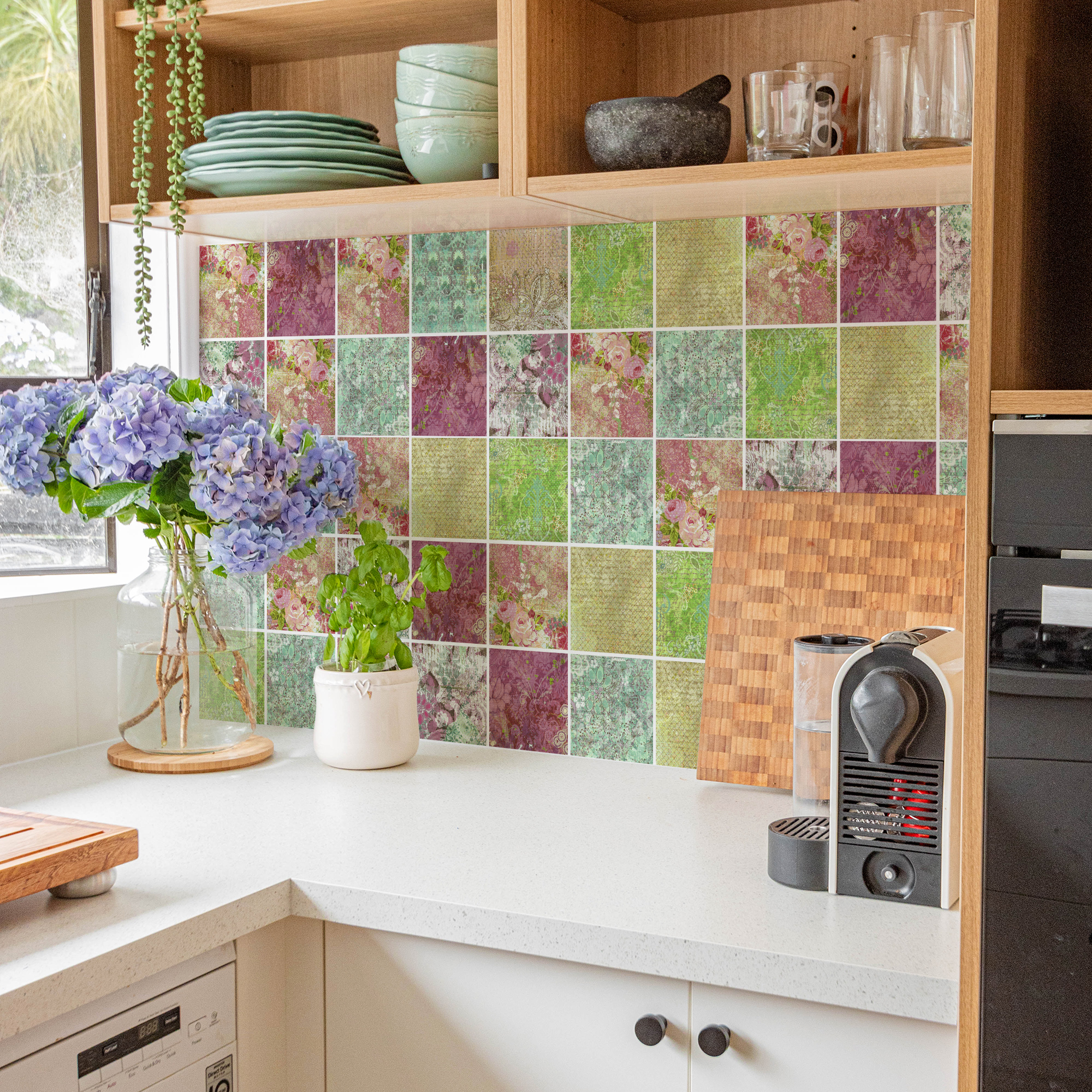 | Casadart | Vinis Autocolantes, Papel de Parede e Painéis Decorativos Colorful tiled kitchen wall above a white countertop, with hydrangea bouquet in a vase and green bowls on a shelf.
