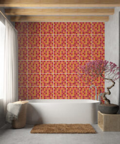 Freestanding white bathtub against a red-orange mosaic tile wall, with wooden ceiling beams and a curtain on the left.