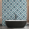 | Casadart | Vinis Autocolantes, Papel de Parede e Painéis Decorativos Black freestanding bathtub in front of a teal and gray geometric tiled wall pattern behind it