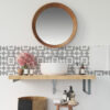 | Casadart | Vinis Autocolantes, Papel de Parede e Painéis Decorativos Round wooden-framed mirror above a marble sink with patterned tile backsplash and vanity items on a wooden counter.