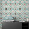 | Casadart | Vinis Autocolantes, Papel de Parede e Painéis Decorativos Patterned tile wall with teal interlocking shapes and black floral centers behind a dark gray dresser and blue cushions on top.