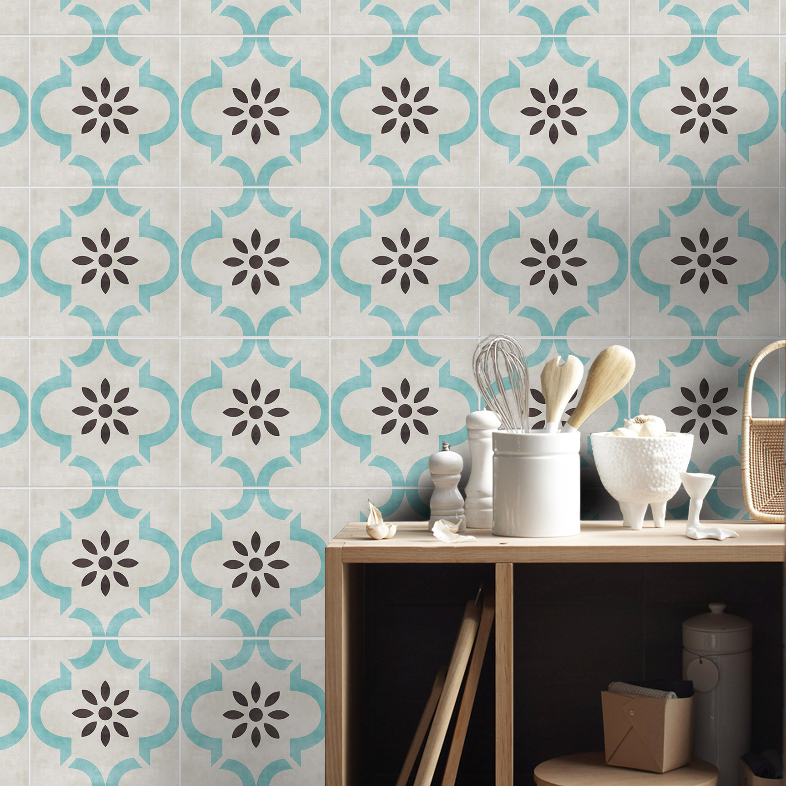 maq9 | Casadart | Vinis Autocolantes, Papel de Parede e Painéis Decorativos Decorative tiled backsplash with teal quatrefoil patterns and brown floral centers; a wooden counter with white canisters and kitchen utensils.