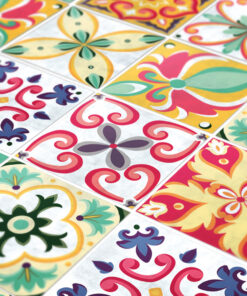 Colorful decorative ceramic tiles with floral and scroll motifs in red, yellow, green, and blue.
