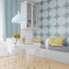 | Casadart | Vinis Autocolantes, Papel de Parede e Painéis Decorativos Dining area with white table and chairs, blue pendant light, yellow vase of roses, and a glass-front cabinet against intricately patterned blue wallpaper.