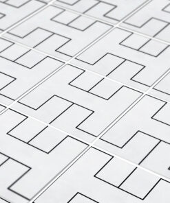 Close-up of white rectangular cards with bold black L-shaped outlines arranged in a grid pattern.