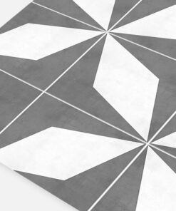 Abstract grayscale geometric tile pattern with radiating starburst shapes, decorative floor design.