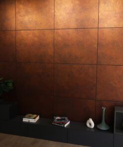 Dark modern shelf area with a stack of magazines and books, two white ceramic vases, and a potted plant against a copper-toned tiled wall.