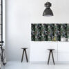 | Casadart | Vinis Autocolantes, Papel de Parede e Painéis Decorativos Modern kitchen corner with a tropical-patterned wallpaper panel, pendant light, white cabinets, and two wooden stools.