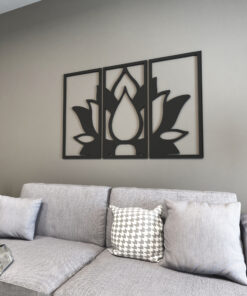 | Casadart | Vinis Autocolantes, Papel de Parede e Painéis Decorativos Gray fabric sofa with two patterned throw pillows and a blanket, against a wall with a three-panel botanical wall art piece.