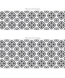 Repeating black-and-white tile pattern with ornate floral medallions on a white background in a grid.